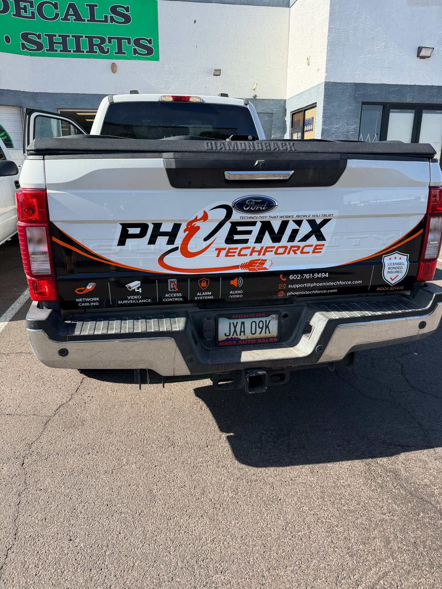 Customers vehicle with new decal graphics installed at our physical location located in Phoenix by the Paradise Valley Community College. 
